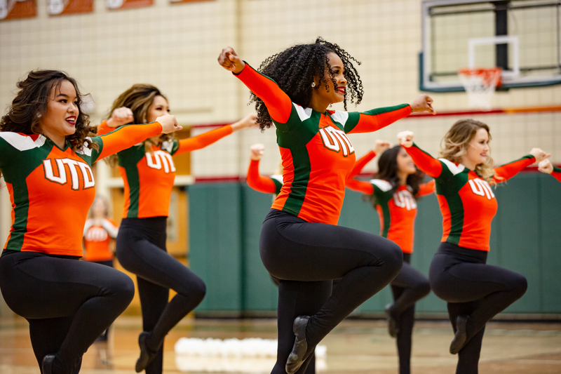 Power Dancers performing at a UTD basketball game